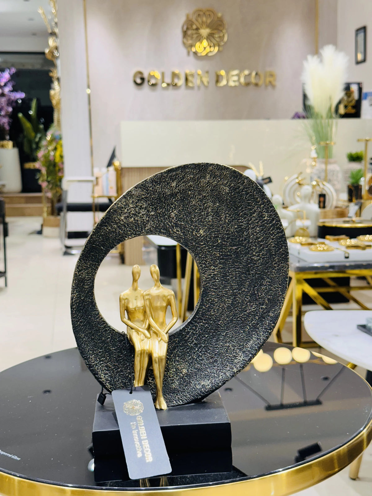 Contemporary Romantic Lovers Sitting on Moon Circle Sculpture