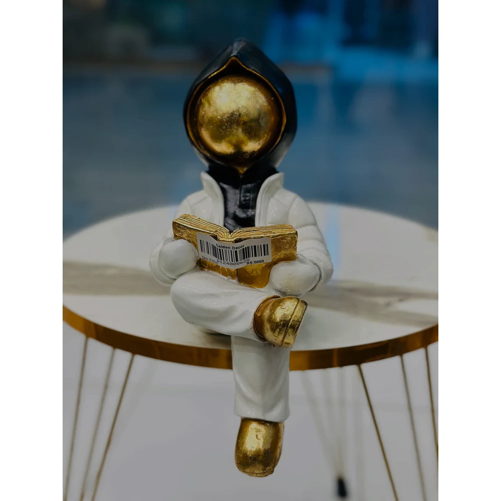 Modern Space Astronaut Reading Book Gold & White Figurine